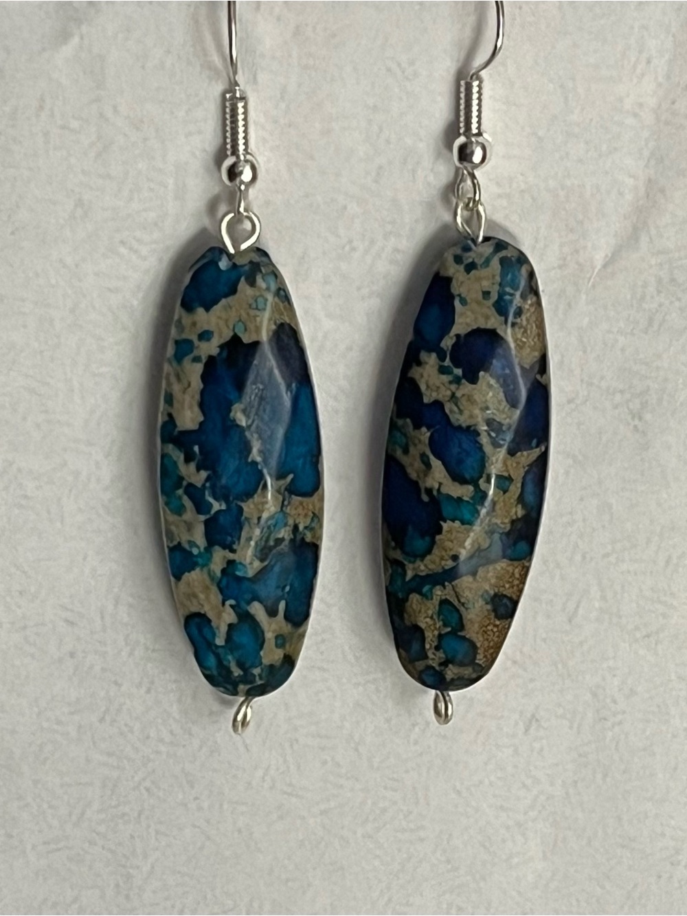 Silver Faux Oval Blue Stone Dangle Earrings